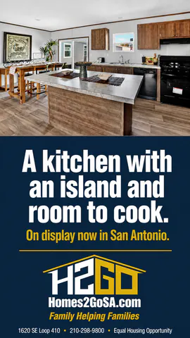 Tall ad: “A kitchen with an island and room to cook. On display now in San Antonio.” over a photo of the kitchen.